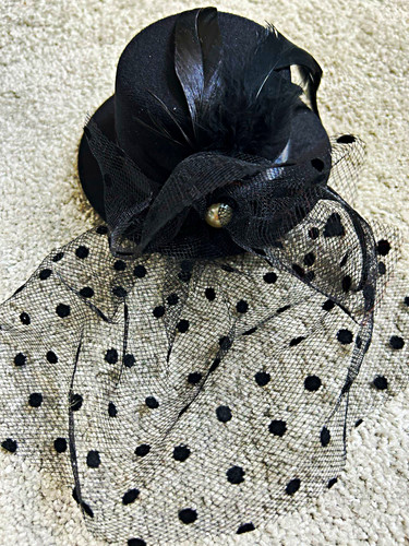 Brand new boxed black feather - brand,